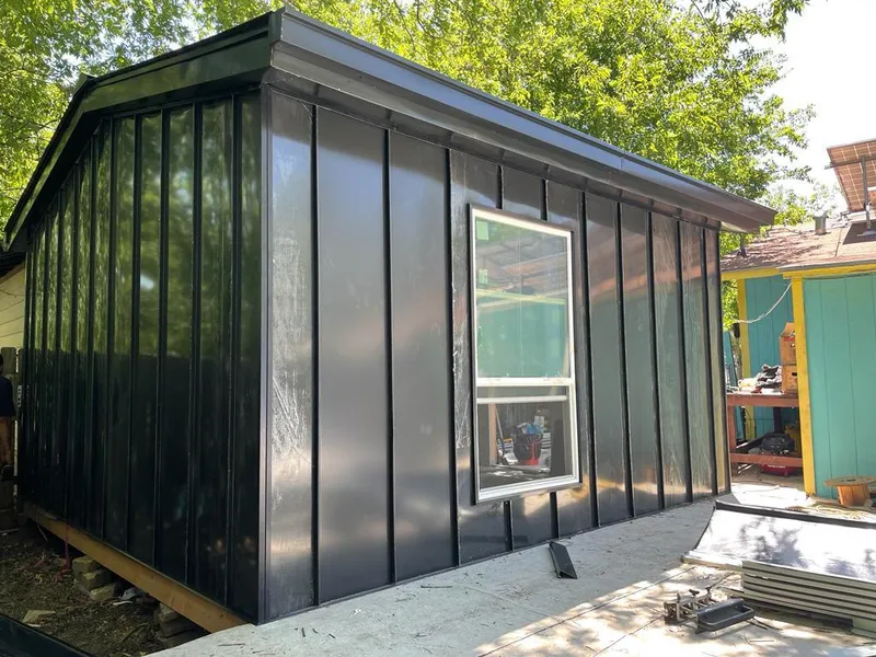 Black standing seam metal wall panels for Roof Inspection in Lindon